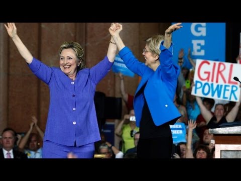 clinton and warren embrace