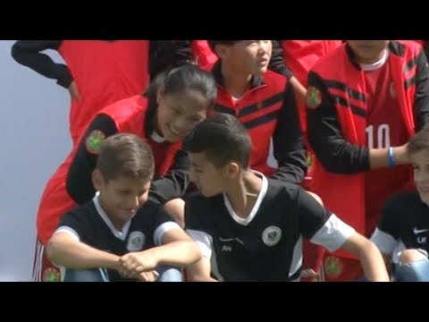 xi and merkel attend football match between german