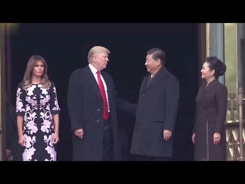 president xi and his wife hold welcome ceremony