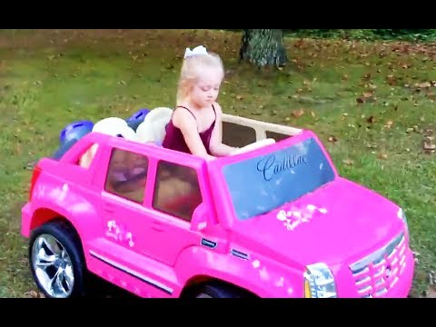 playing in the park on the pirate ship playground for kids w pink car