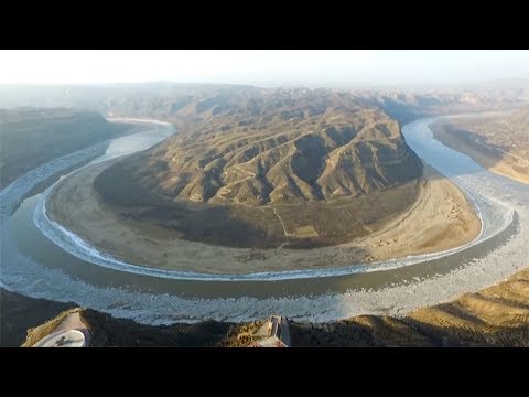 aerial view of ice sheets in asias third longest waterway