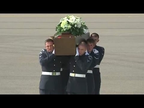 british victims of tunisia massacre return home