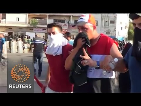 security forces fire on protesters in baghdads