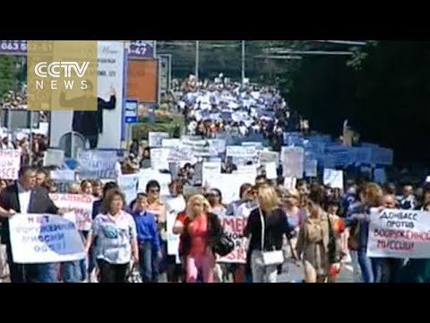 thousands protest osce presence in rebelheld ukraine