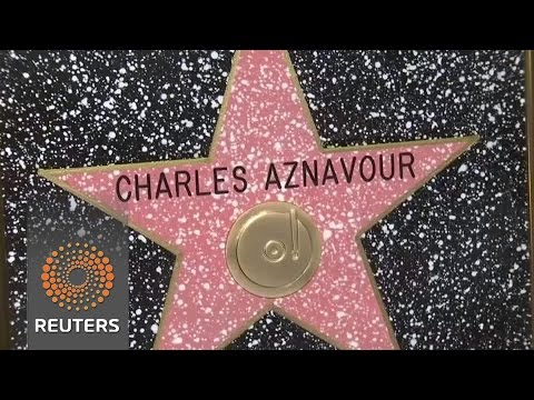 aznavour gets hollywood walk of fame star