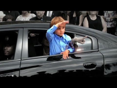 boy salutes hero father killed in the line of