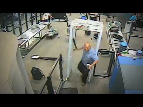 video shows man storm tsa with machete