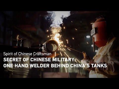 one hand welder behind china’s tanks