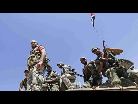 syria army breaks isil siege