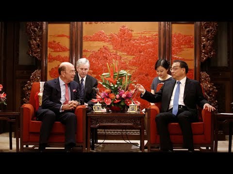 china premier urges us commerce secretary to treat investments