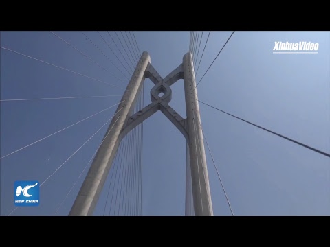 worlds longest crosssea bridge near completion