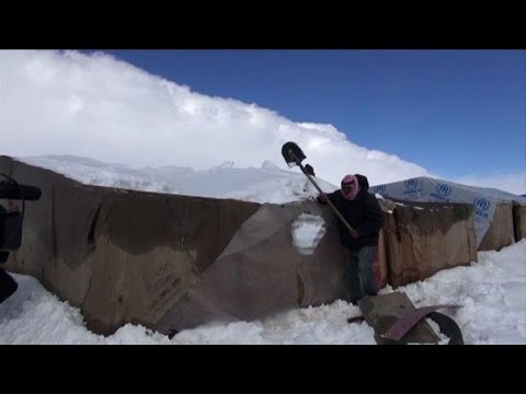 syrian refugees struggle with snow storm in lebanon