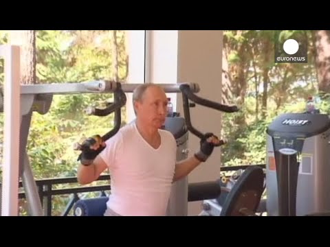 putin works out in gym with pm medvedev